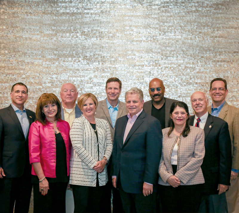 Helios Education Foundation’s Board of Directors. From Left to Right:  Paul Luna, President and CEO; Maria Sastre, Director; Tom Herndon, Director; Jane Roig, Director; Steve Wheeler, Director; Vince Roig, Founding Chairman; Vada Manager, Director; Ioanna Morfessis, Director; Don Aripoli, Director; Mark Fernandez, Director